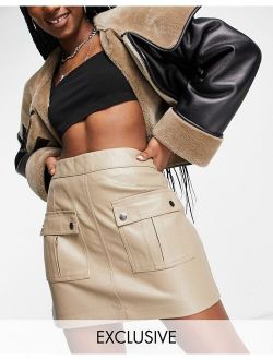 Only exclusive pocket detail faux leather mini skirt in stone