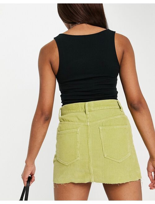 ASOS DESIGN cord mid rise 'original' mini skirt in green