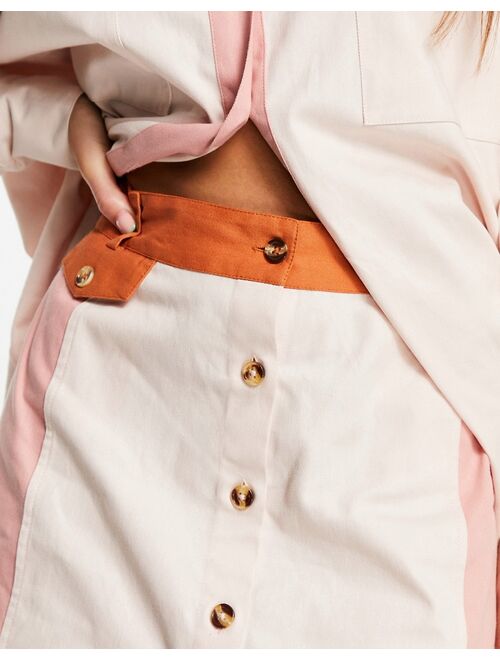 ASOS DESIGN A-line button mini skirt in color block