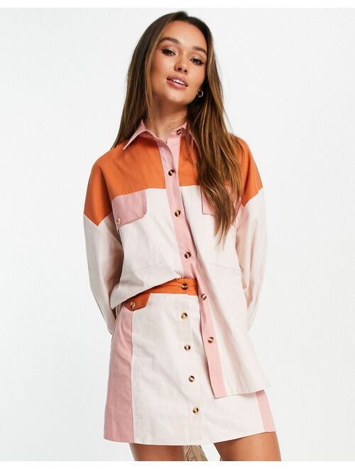 ASOS DESIGN A-line button mini skirt in color block