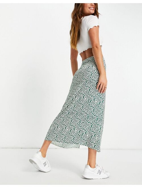 ASOS DESIGN midi skirt with thigh split in green & ivory print