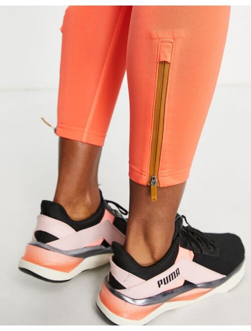 Puma x Helly Hansen training leggings in coral and tan