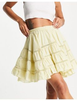 mini skirt with lace trim insert in washed yellow