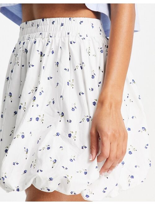 ASOS DESIGN cotton puffball mini skirt in floral print