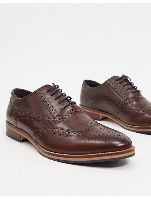 ASOS DESIGN brogue shoes in brown leather with natural sole and color details