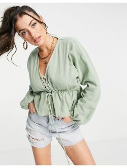 natural crinkle lace up front top in sage