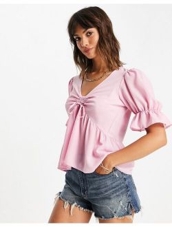 ruched front peplum top with puff sleeve in blush