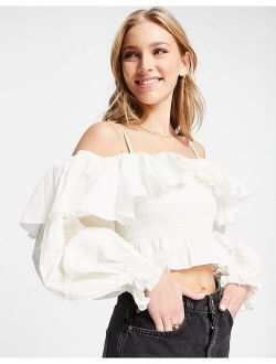 cold shoulder ruffle top with eyelet insert in ivory