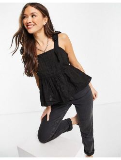 square neck sun top with tie straps in textured grid in black