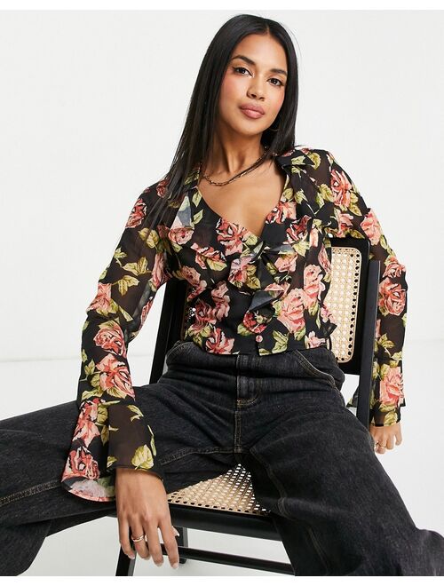 ASOS DESIGN frill neck crop shirt with flare sleeve and ruffle detail in brown floral print
