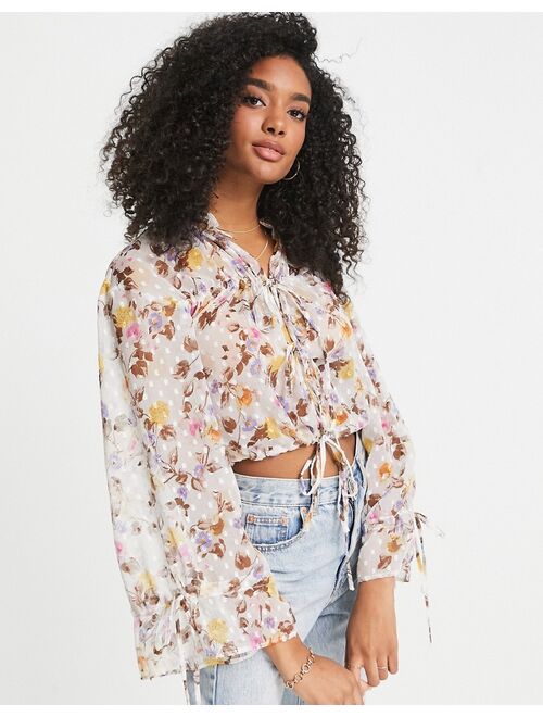 ASOS DESIGN long sleeve textured top with tie front in tonal floral print