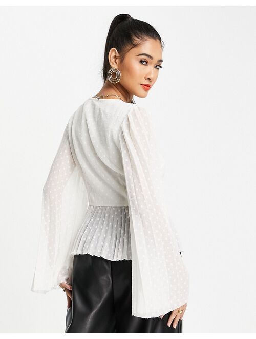 ASOS DESIGN textured pleated peplum shirt with button and tie detail with long sleeve in ivory