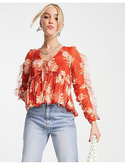 ASOS DESIGN v neck blouse with frill long sleeve detail in red print