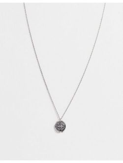 necklace with compass in burnished silver tone