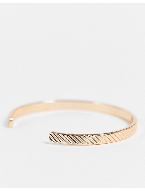 ASOS DESIGN cuff bracelet with texture in gold tone