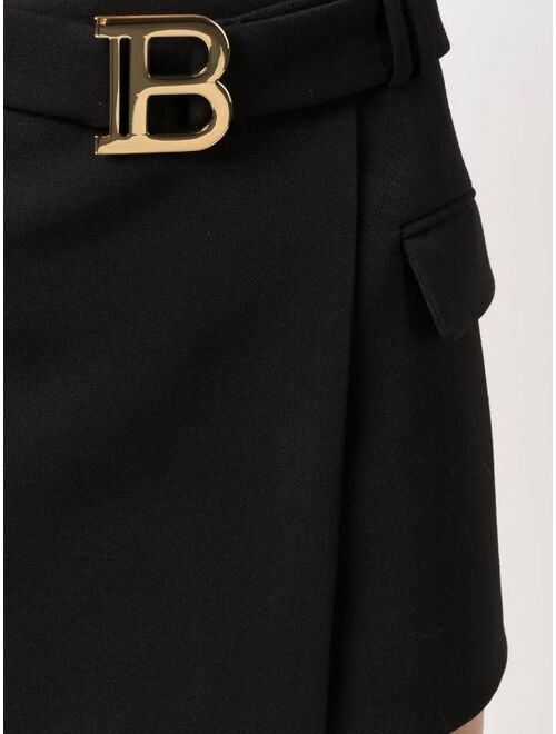 Balmain logo-buckle wool skirt