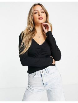 ruched long sleeve top in black