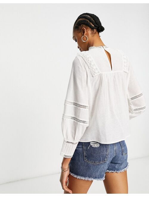 Vero Moda blouse with lace inserts in white