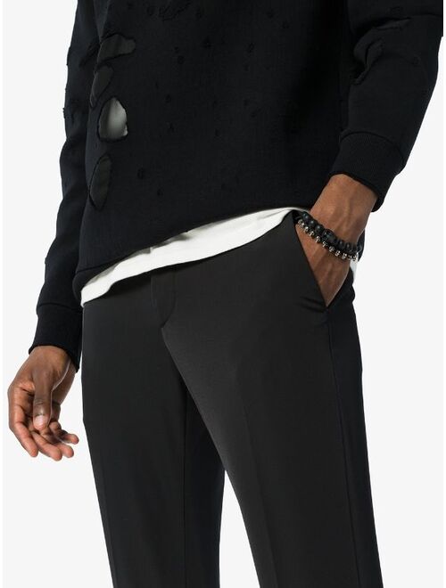 Alexander McQueen black and silver metallic skulls drawstring bracelet