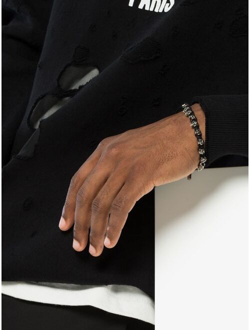Alexander McQueen black and silver metallic skulls drawstring bracelet