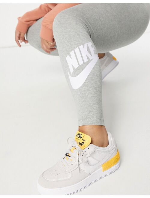 Nike Plus essential leggings in gray with futura logo print