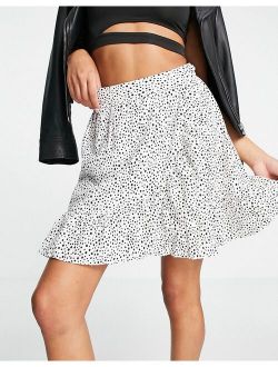 wrap mini skirt in white polka dot