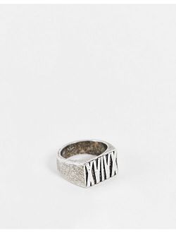 signet ring with roman numerals in burnished silver