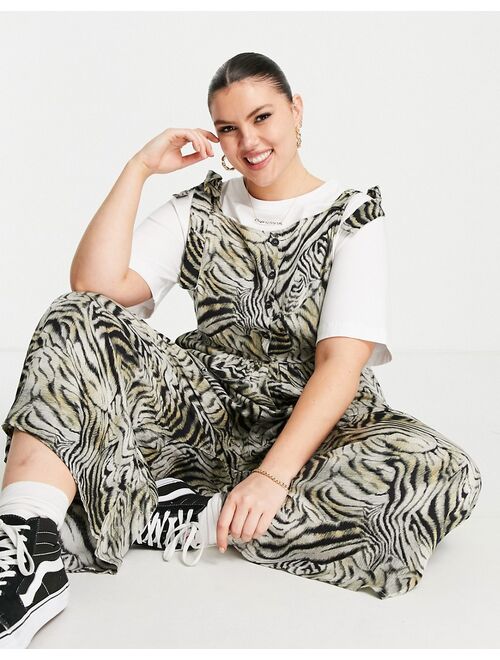 ASOS DESIGN curve spun tie shoulder button front overalls in animal print