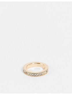 slim band ring with crystals in gold tone