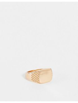 square signet ring with embossing in gold tone