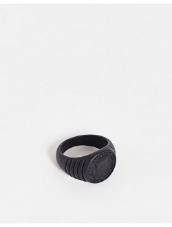signet ring with coin detail and embossing in matte black