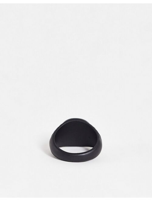 ASOS DESIGN signet ring with coin detail and embossing in matte black