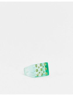 plastic signet ring in green with crystals