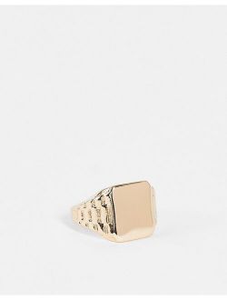 signet ring with side detail embossing in gold tone