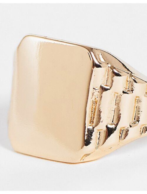 ASOS DESIGN signet ring with side detail embossing in gold tone