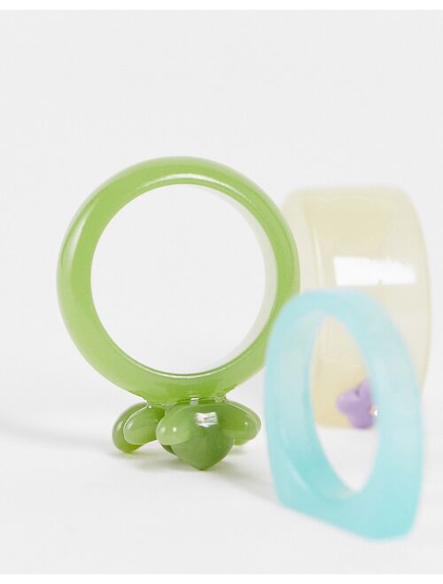 ASOS DESIGN 3 pack plastic ring set with bear and flower design in multicolor