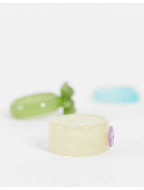 ASOS DESIGN 3 pack plastic ring set with bear and flower design in multicolor