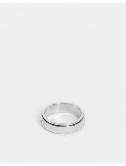 stainless steel movement band ring with embossed detail in silver
