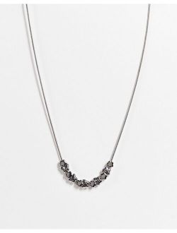neckchain with metal butterfly and flower beads in silver tone