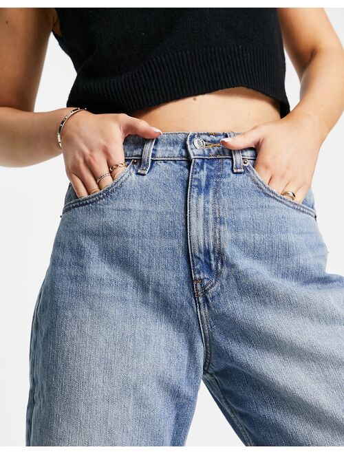 ASOS DESIGN high rise slouchy mom jeans in stone wash with rips