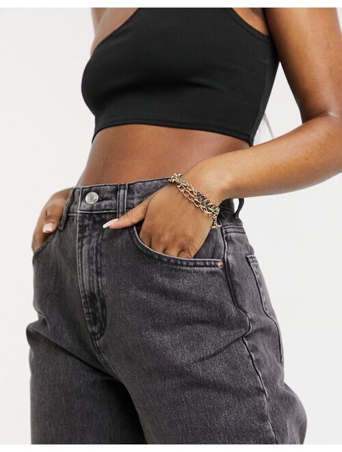 ASOS DESIGN high-rise 'slouchy' mom jeans in washed black with rips