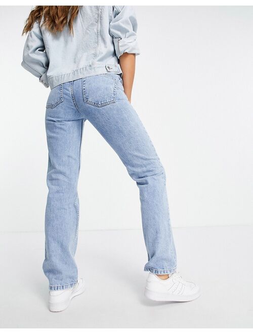 ASOS DESIGN mid rise 90s straight leg jeans in vintage light wash