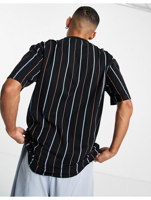 Karl Kani small signature pinstripe t-shirt in black