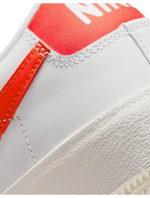 Nike Blazer Low '77 VNTG sneakers in white/team orange