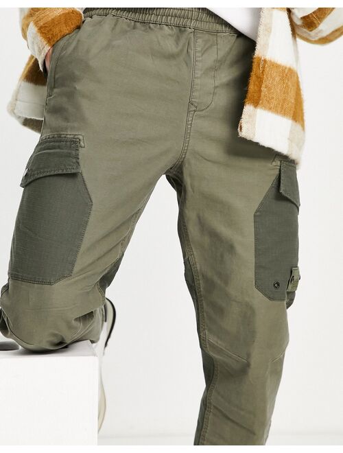 River Island tapered blocked cargo pants in washed khaki