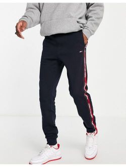 performance sweatpants with taping in navy