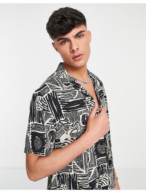 ASOS DESIGN relaxed camp collar shirt in monochrome vintage print