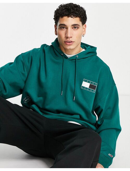 Tommy Hilfiger Tommy Jeans Metallic capsule back flag print hoodie relaxed fit in green