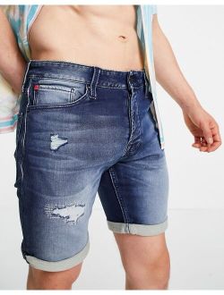 denim shorts with rip in mid blue