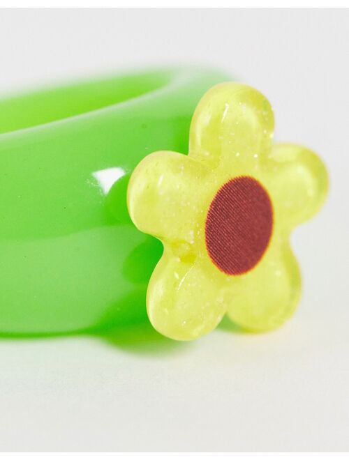 ASOS DESIGN plastic ring with yellow flower in green